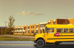 School with bus in front