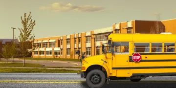 School with bus in front
