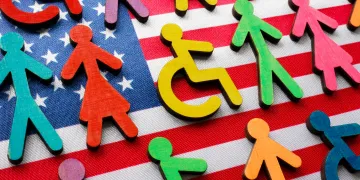 American Flag with images of colorful people cutouts on top including individuals in wheelchairs
