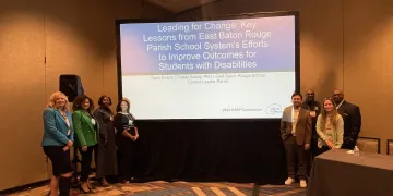 EBR and PROGRESS Center presenters in front of presentation slides