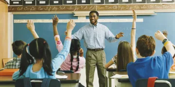 Teacher in front of classroom