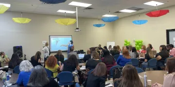 Group of educators looking at screen