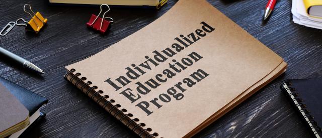 Notebook with text saying Individualized Education Program