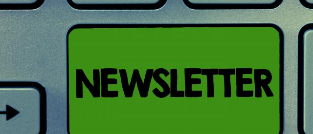 Keyboard with green key showing Newsletter