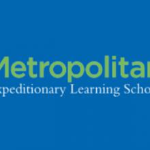 Large green text Metropolitan stacked on top of smaller text Expeditionary Learning School