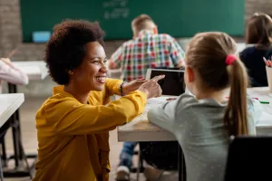 Teacher with Tablet and Student