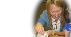 Teacher and student working together