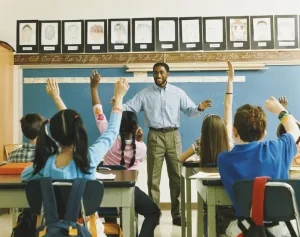 Teacher in front of classroom