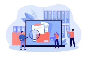 computer with files and magnifying glass